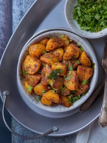 Jeera aloo - Roasted potatoes with cumin seeds and spicy masala